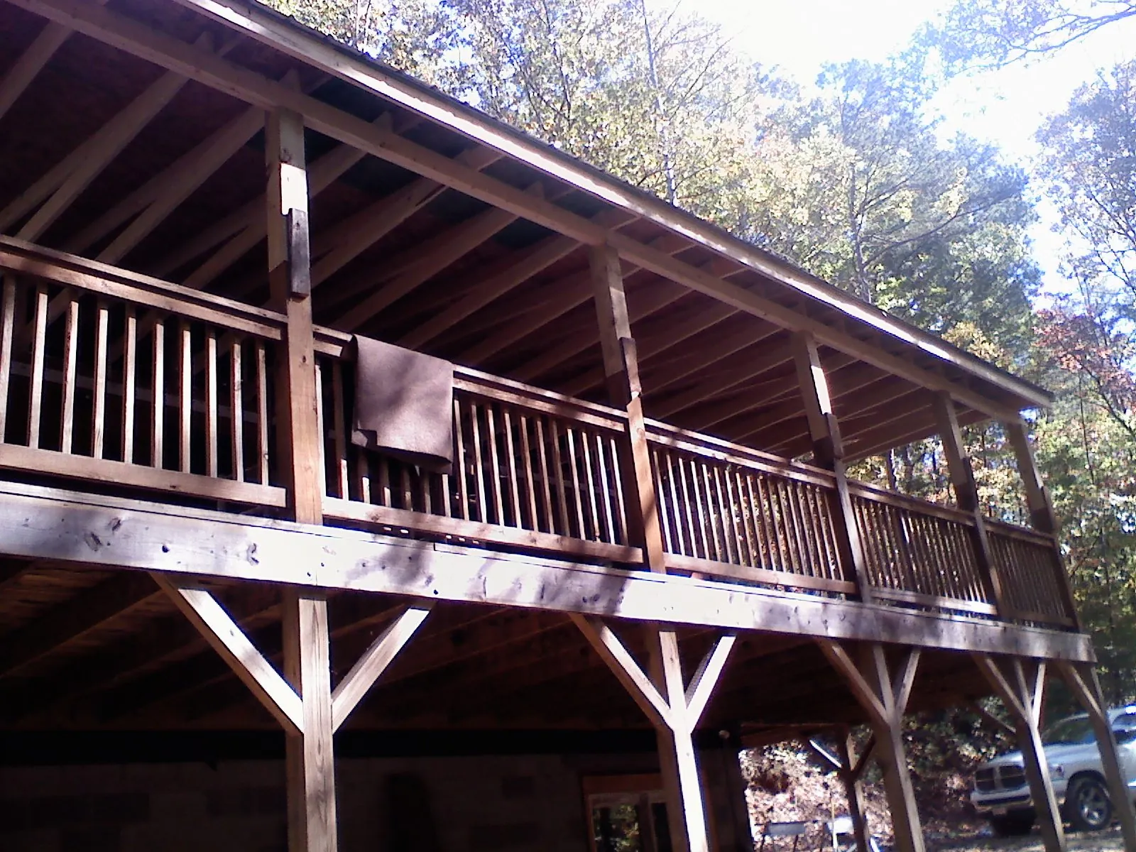 Timber framing under a new elevated porch and deck — Roof Leak Repair in Armour by Roofing Brothers